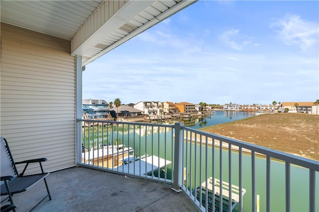 balcony featuring a water view