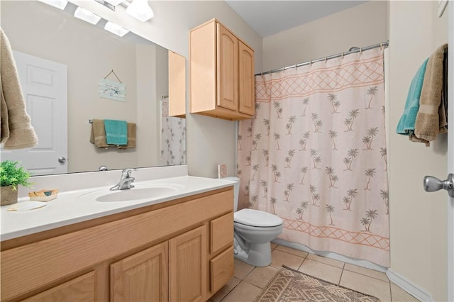 bathroom with tile patterned floors, vanity, toilet, and a shower with curtain