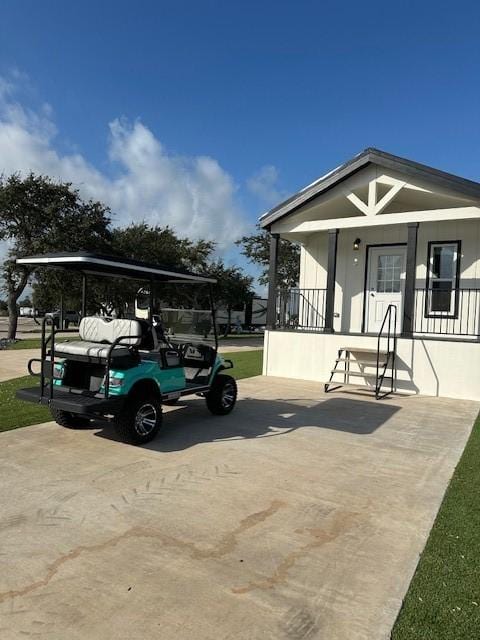 exterior space featuring a carport