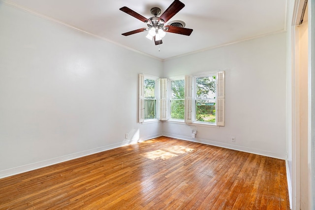 unfurnished room with light wood-type flooring, ceiling fan, and ornamental molding