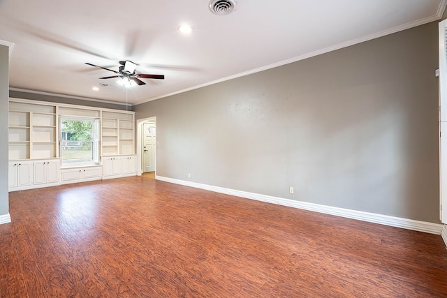 unfurnished room with hardwood / wood-style floors, ceiling fan, and crown molding