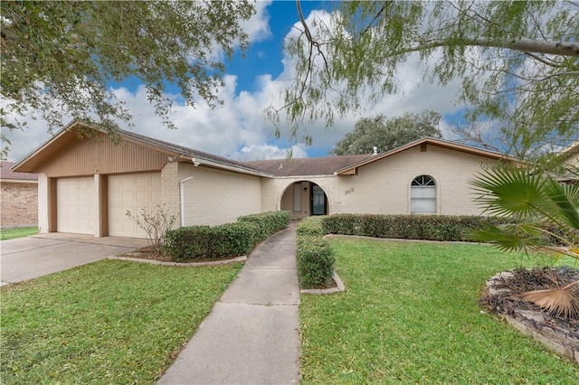 ranch-style house with a garage and a front yard