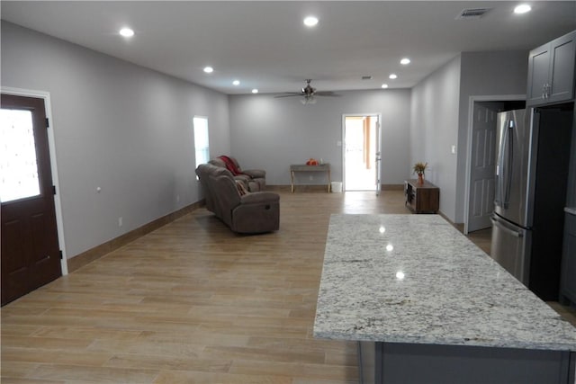 5334 Fm 1069th Rd N, Aransas Pass, TX 78336 - entrance foyer featuring ceiling fan, recessed lighting, light wood-style floors, and baseboards