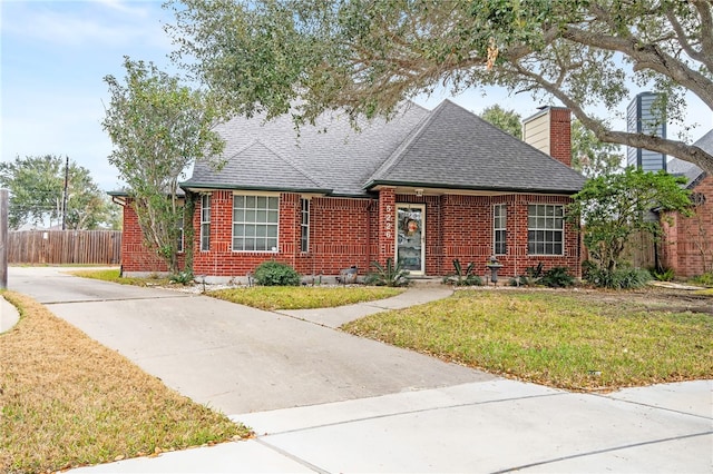 view of front of property with a front lawn