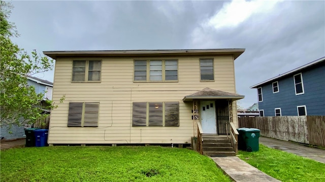 view of front property with a front lawn