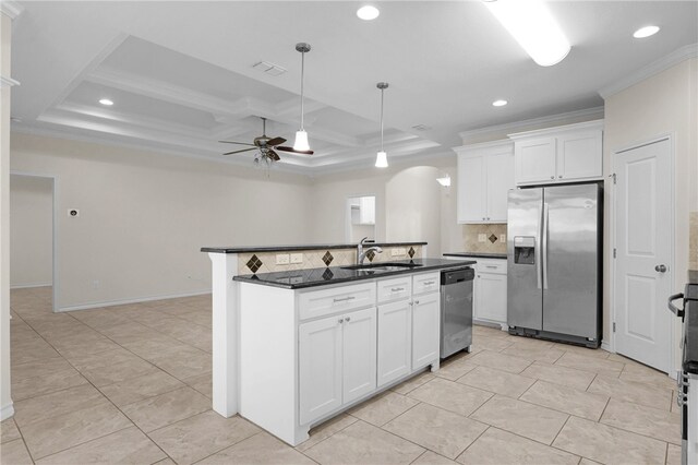 13822 Whitecap Blvd, Corpus Christi, TX 78418 - kitchen with stainless steel appliances, dark countertops, arched walkways, recessed lighting, and tasteful backsplash