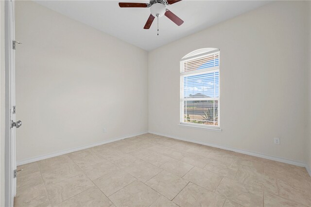 13822 Whitecap Blvd, Corpus Christi, TX 78418 - spare room with ceiling fan and baseboards