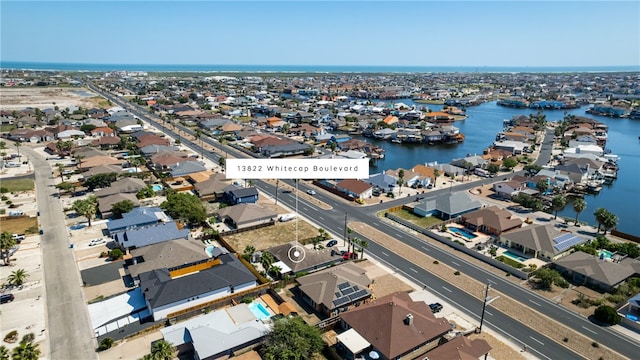 13822 Whitecap Blvd, Corpus Christi, TX 78418 - aerial perspective of suburban area featuring a nearby body of water