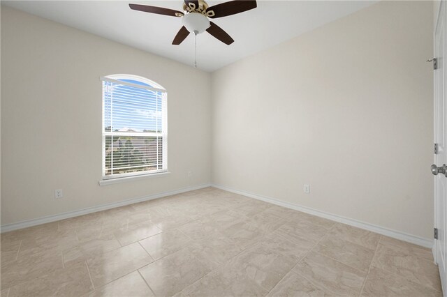 13822 Whitecap Blvd, Corpus Christi, TX 78418 - spare room featuring ceiling fan and baseboards