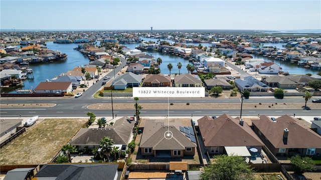 13822 Whitecap Blvd, Corpus Christi, TX 78418 - aerial perspective of suburban area featuring a nearby body of water