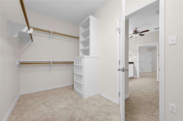 13822 Whitecap Blvd, Corpus Christi, TX 78418 - walk in closet with ceiling fan