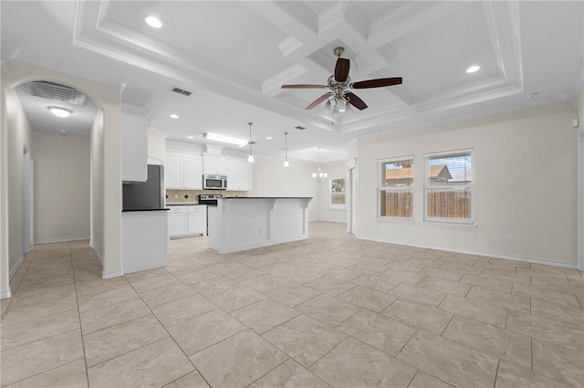 13822 Whitecap Blvd, Corpus Christi, TX 78418 - kitchen with fridge, open floor plan, stainless steel microwave, crown molding, and a ceiling fan