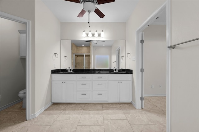 13822 Whitecap Blvd, Corpus Christi, TX 78418 - full bath with a ceiling fan, double vanity, and a stall shower