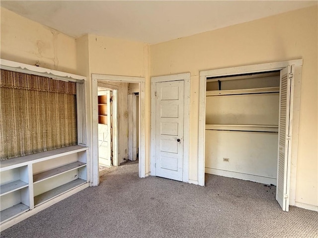 unfurnished bedroom featuring carpet floors