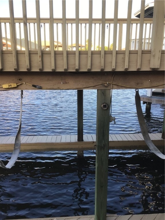 dock area with a water view