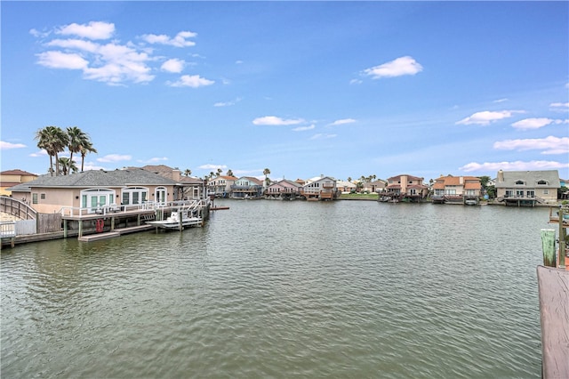 dock area with a water view