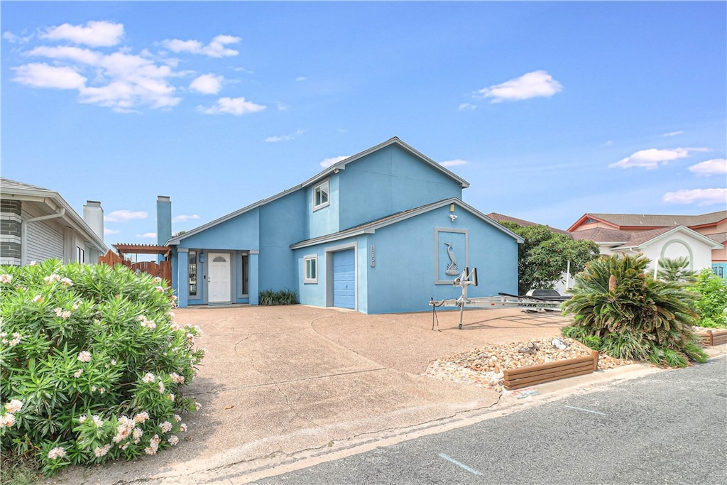 view of front of house with a garage