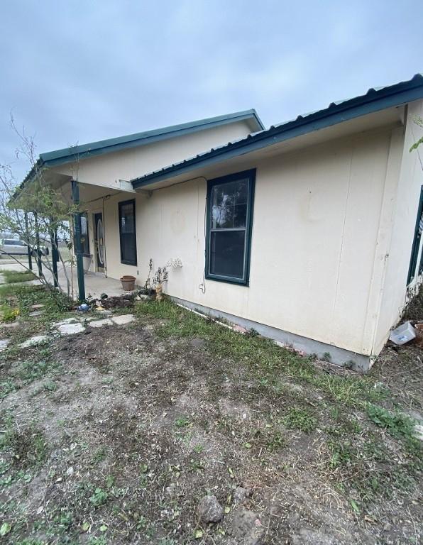 view of home's exterior with a patio