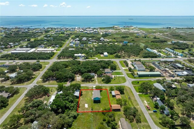 1123 S Fuqua St, Rockport, TX 78382 - aerial view of property and surrounding area with property boundaries highlighted and a large body of water