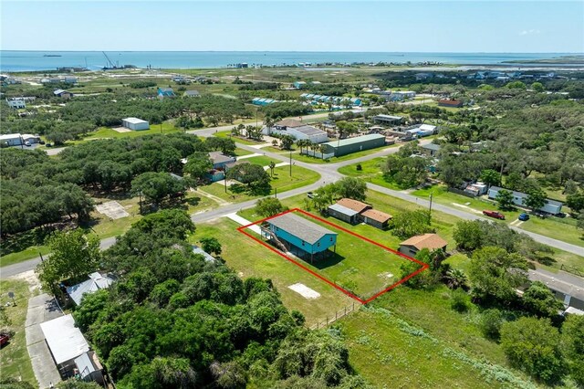 1123 S Fuqua St, Rockport, TX 78382 - aerial view of property and surrounding area featuring property parcel outlined and a large body of water