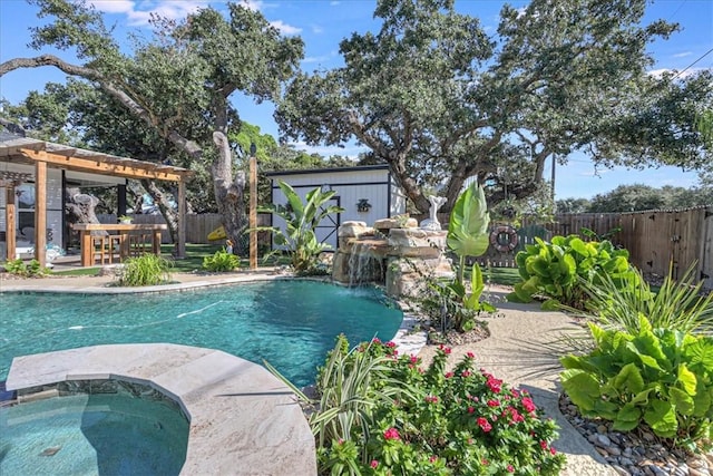 view of swimming pool featuring a patio area, an in ground hot tub, and an outdoor bar