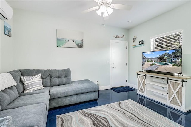 living room with a wall unit AC and ceiling fan