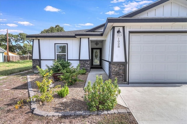 view of front of property with a garage