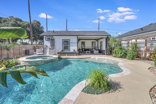 view of swimming pool featuring an in ground hot tub and a patio