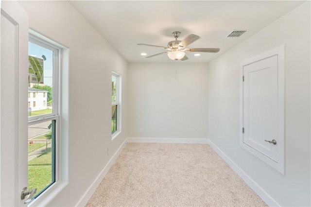1101 6th St, Corpus Christi, TX 78404 - spare room with light colored carpet, a ceiling fan, and recessed lighting