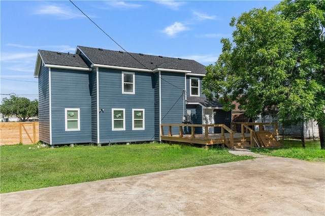 1101 6th St, Corpus Christi, TX 78404 - back of house featuring a wooden deck, a patio area, and roof with shingles