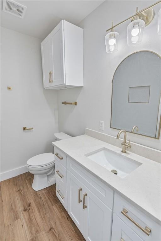 1101 6th St, Corpus Christi, TX 78404 - bathroom with vanity and wood finished floors