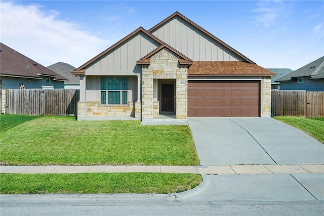 3406 Angelina St, Corpus Christi, TX 78414 - view of front of house featuring stone siding, board and batten siding, a garage, driveway, and a shingled roof