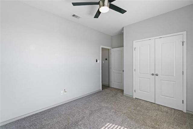 3406 Angelina St, Corpus Christi, TX 78414 - unfurnished bedroom with light colored carpet, a closet, and ceiling fan