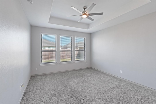 3406 Angelina St, Corpus Christi, TX 78414 - carpeted empty room with a tray ceiling, ceiling fan, and a smoke detector
