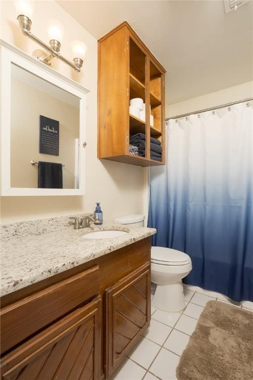 full bath with curtained shower, visible vents, toilet, vanity, and tile patterned flooring