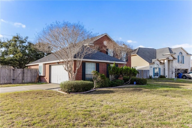 view of front of home with a front yard, a garage, and fence