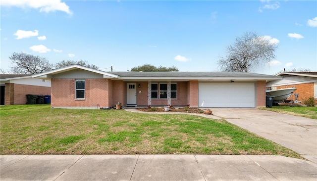 ranch-style home featuring a front yard and a garage