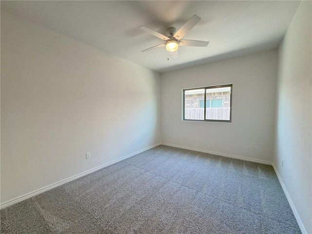 2550 Las Estrellas St, Corpus Christi, TX 78414 - carpeted empty room with a ceiling fan and baseboards