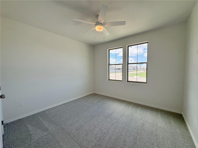 2550 Las Estrellas St, Corpus Christi, TX 78414 - spare room with carpet, a ceiling fan, and baseboards