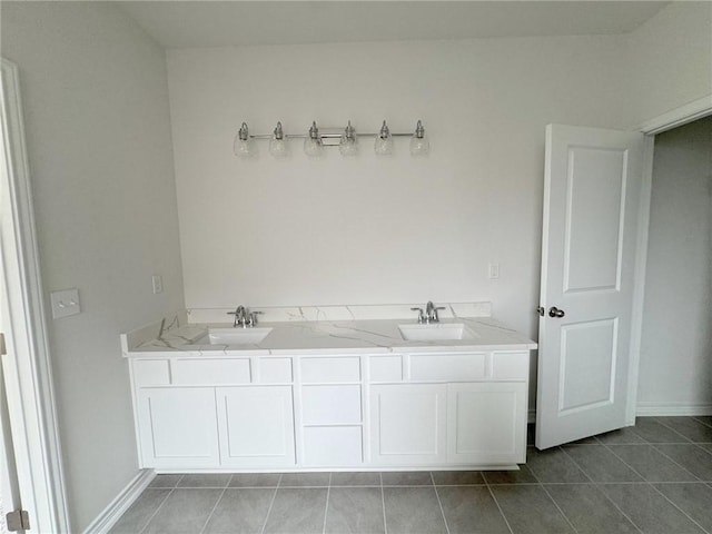 bathroom with vanity and tile patterned floors