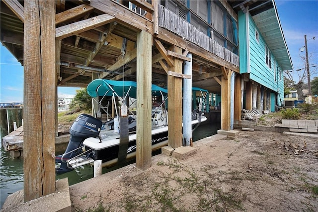 dock area with a water view