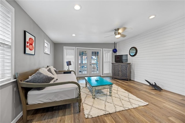 bedroom featuring ceiling fan, recessed lighting, wood finished floors, access to exterior, and french doors