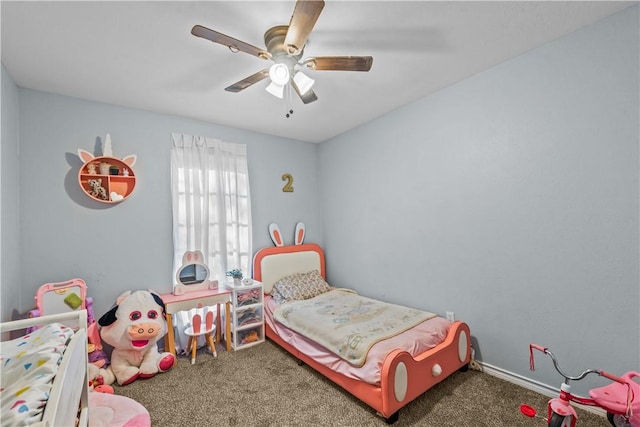 carpeted bedroom with a ceiling fan