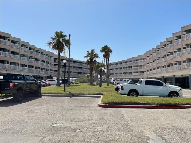 3938 Surfside Blvd Unit 3132, Corpus Christi, TX 78402 - view of apartment building / complex with uncovered parking