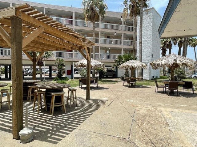 view of home's community with a pergola