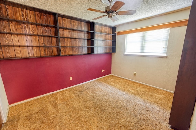 4513 Greensboro Dr, Corpus Christi, TX 78413 - carpeted empty room featuring a textured ceiling and ceiling fan