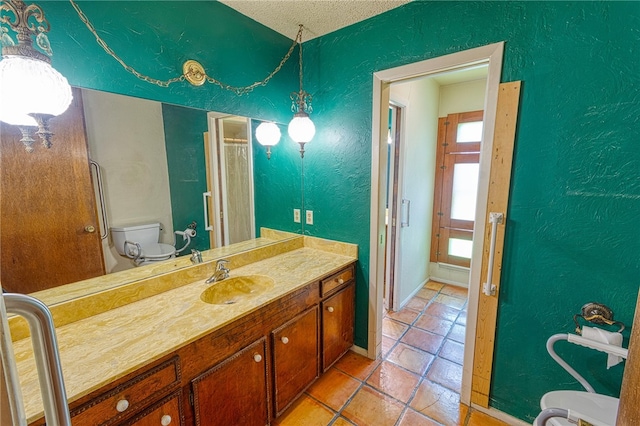 4513 Greensboro Dr, Corpus Christi, TX 78413 - full bathroom with a textured wall, vanity, tile patterned floors, a textured ceiling, and a shower with shower curtain