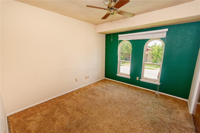 4513 Greensboro Dr, Corpus Christi, TX 78413 - empty room with carpet flooring, a textured ceiling, and ceiling fan