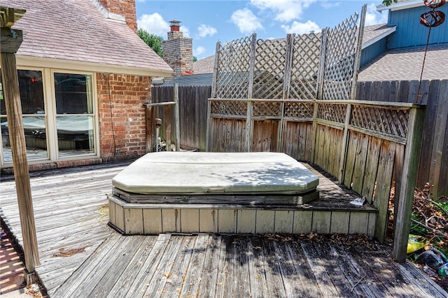 4513 Greensboro Dr, Corpus Christi, TX 78413 - wooden deck with a covered hot tub