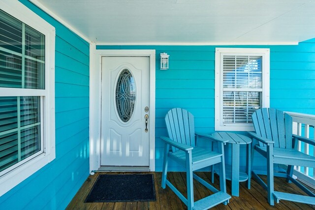 entrance to property with covered porch